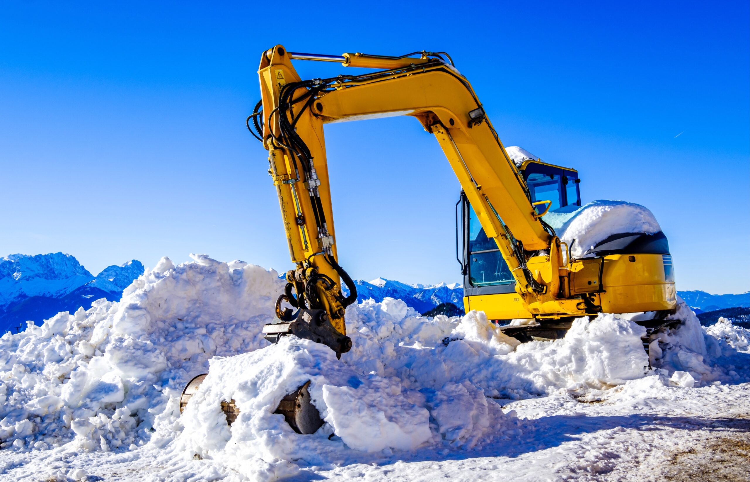 excavator in snow